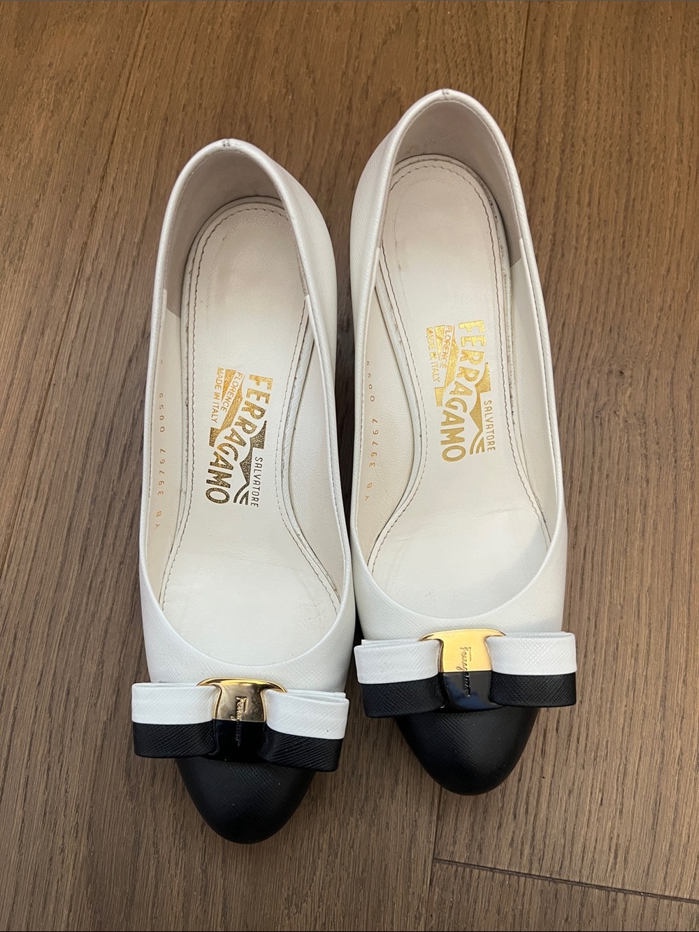 Salvatore Ferragamo White and Black Vara Bow Flats with Gold Hardware